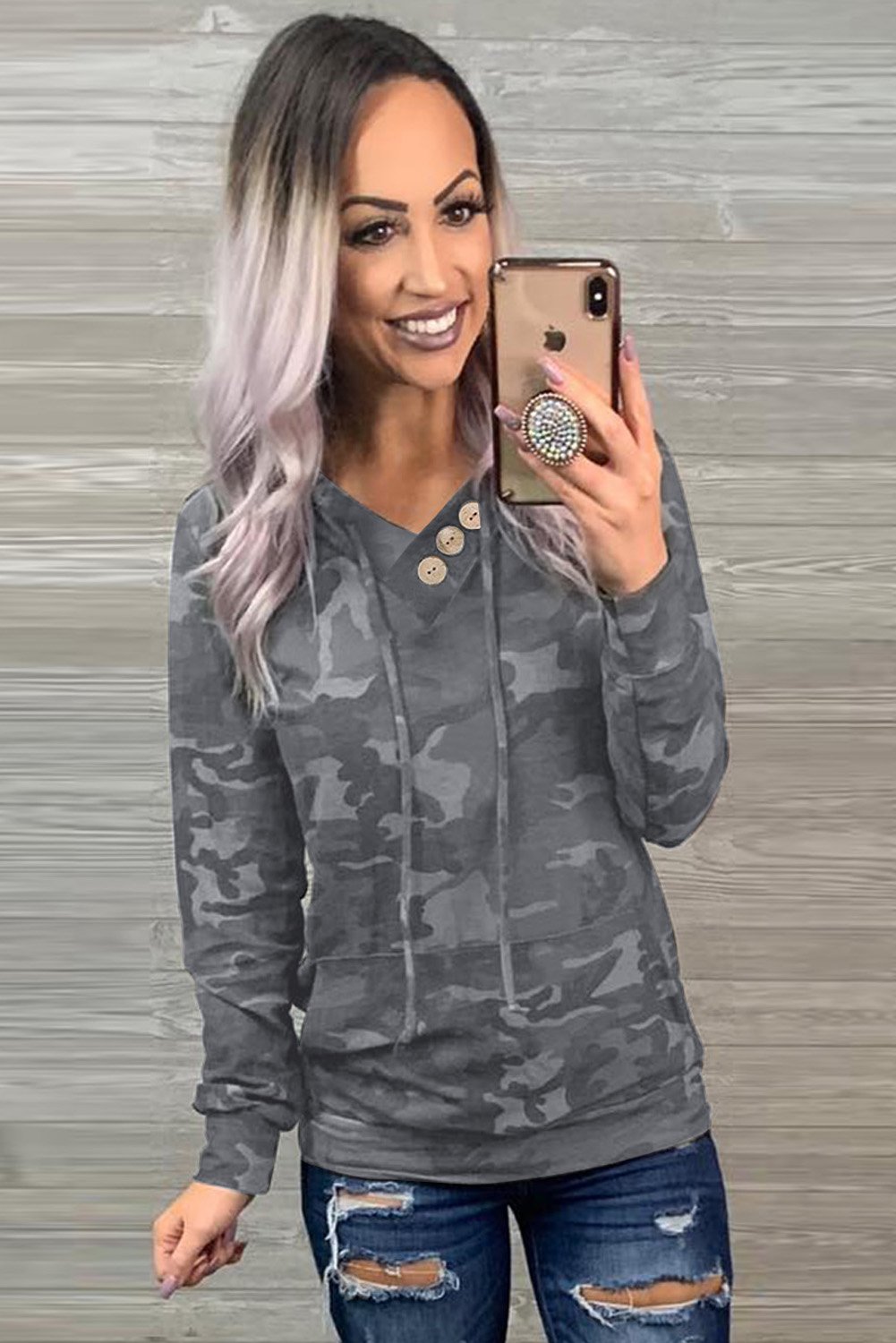 A stylish Print Kangaroo Pocket Hoodie featuring a chic animal print, drawstring hood, and large kangaroo pouch pocket.