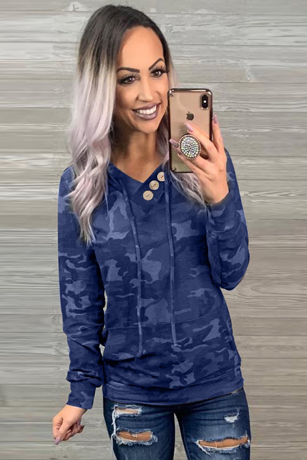 A stylish Print Kangaroo Pocket Hoodie featuring a chic animal print, drawstring hood, and large kangaroo pouch pocket.