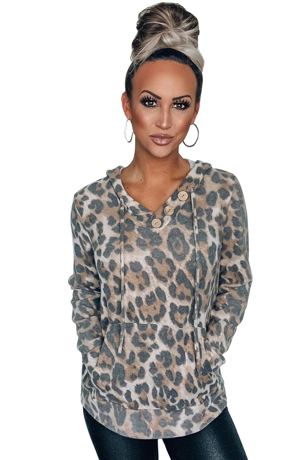 A stylish Print Kangaroo Pocket Hoodie featuring a chic animal print, drawstring hood, and large kangaroo pouch pocket.