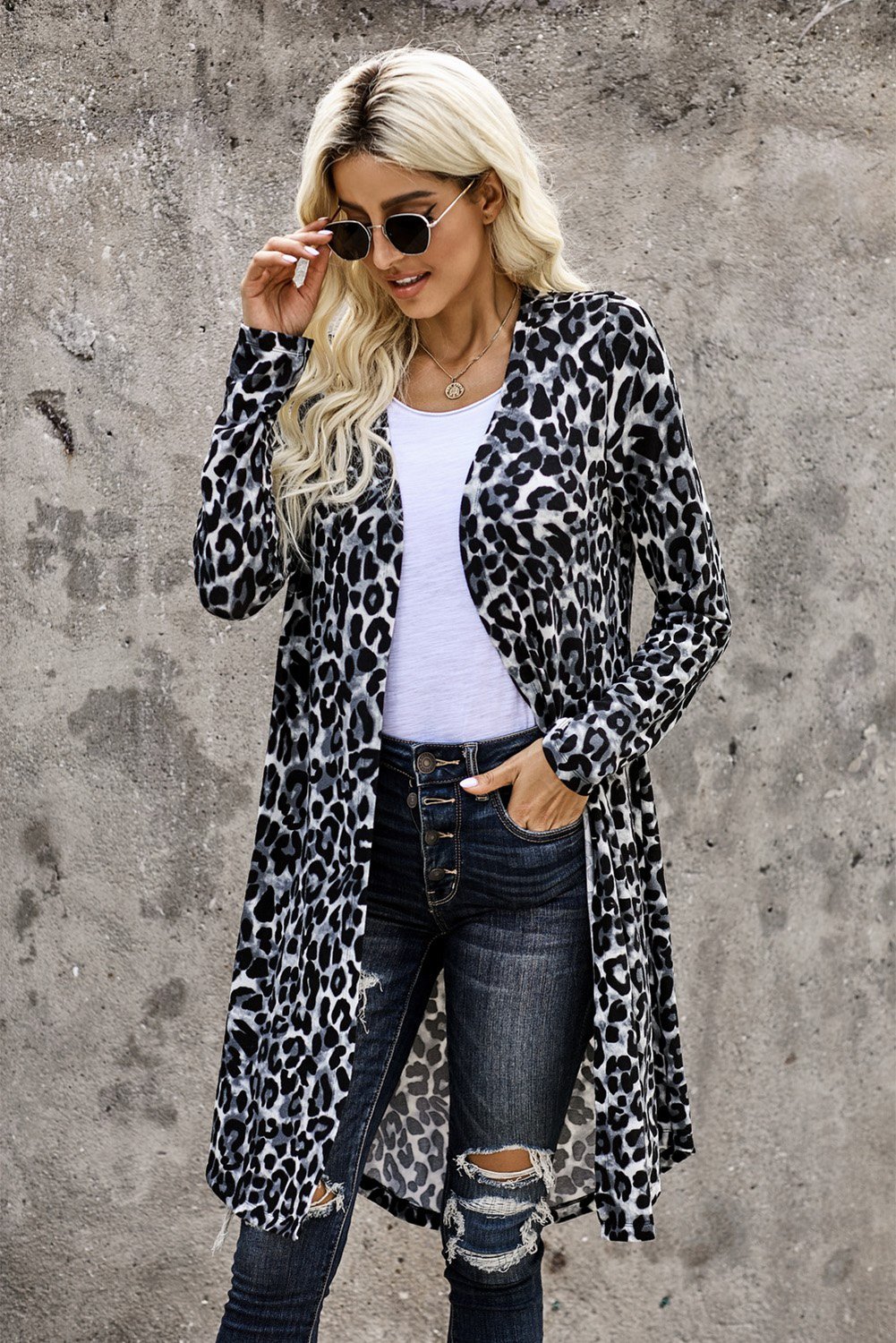 A stylish Print Long Cardigan with long sleeves and a chic all-over print, perfect for casual and work occasions.