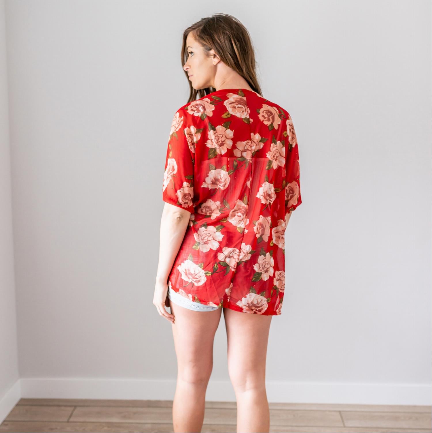 Lightweight Print Mesh Cardigan with floral designs and elbow-length sleeves, perfect for summer styling.