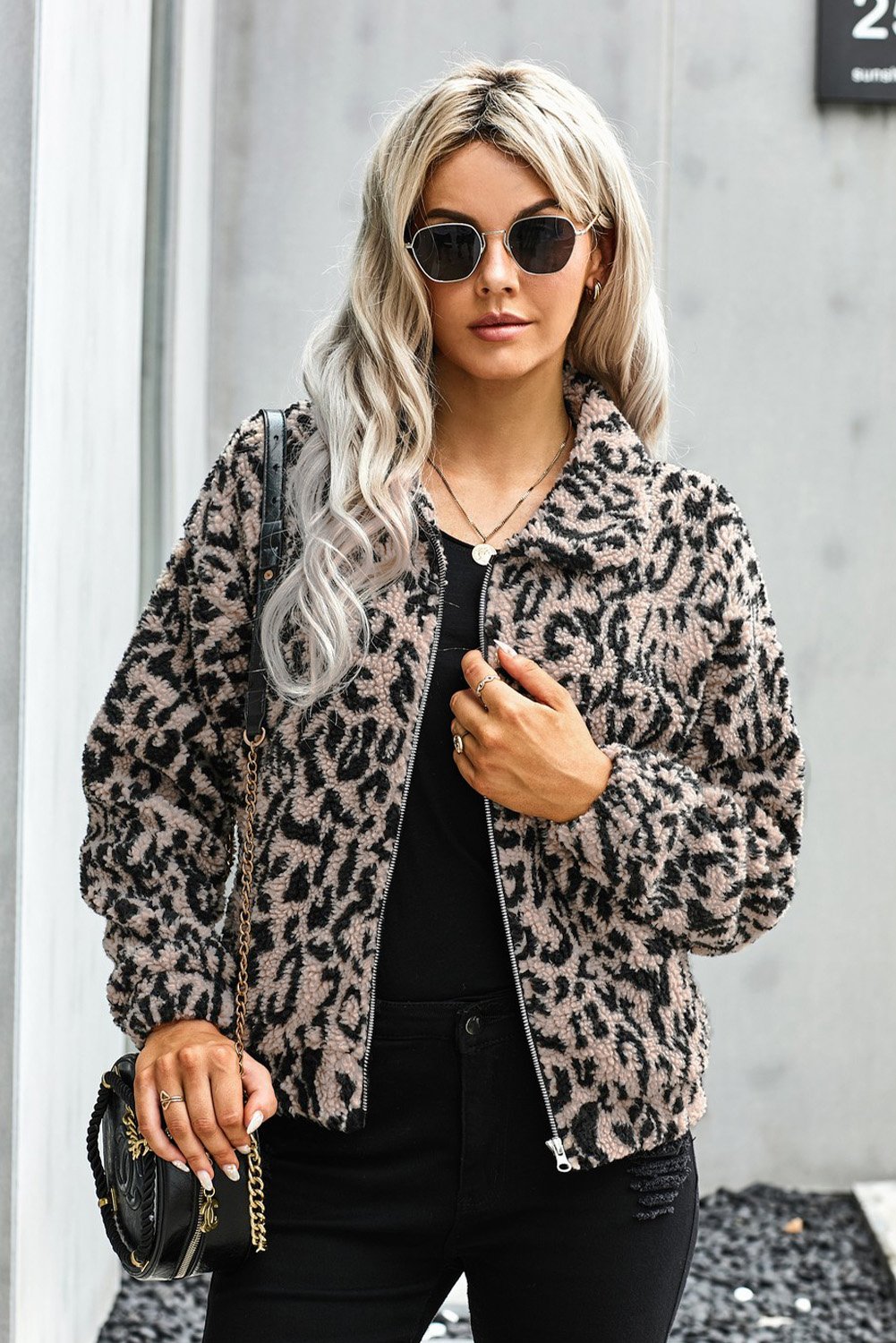 A stylish Print Sherpa Jacket Coat featuring soft sherpa fabric with plaid and leopard prints, open front design, and two side pockets.