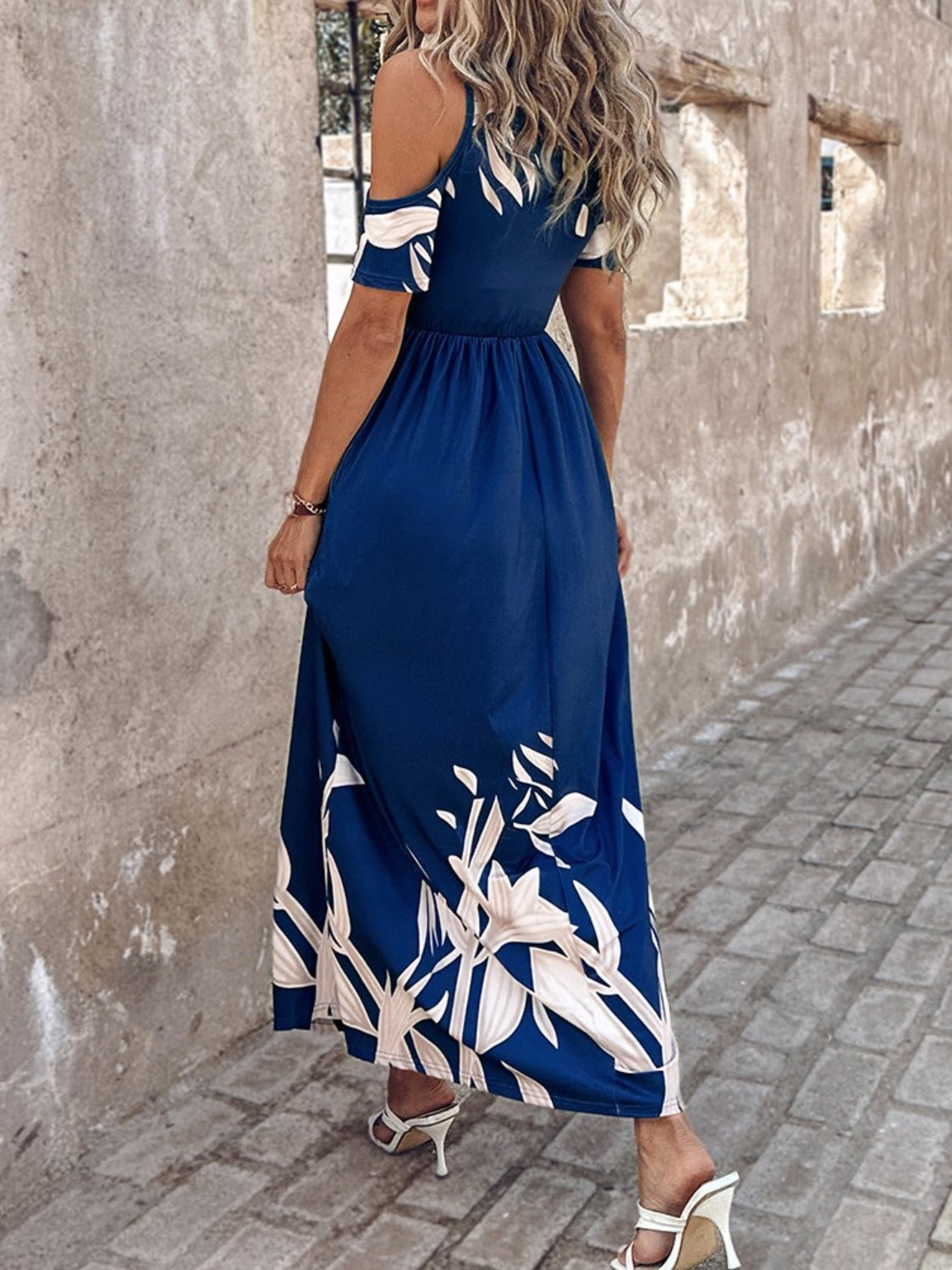 A stylish Printed Cold Shoulder Short Sleeve Maxi Dress featuring a trendy design, side pockets, and a lightweight fabric, perfect for summer wear.