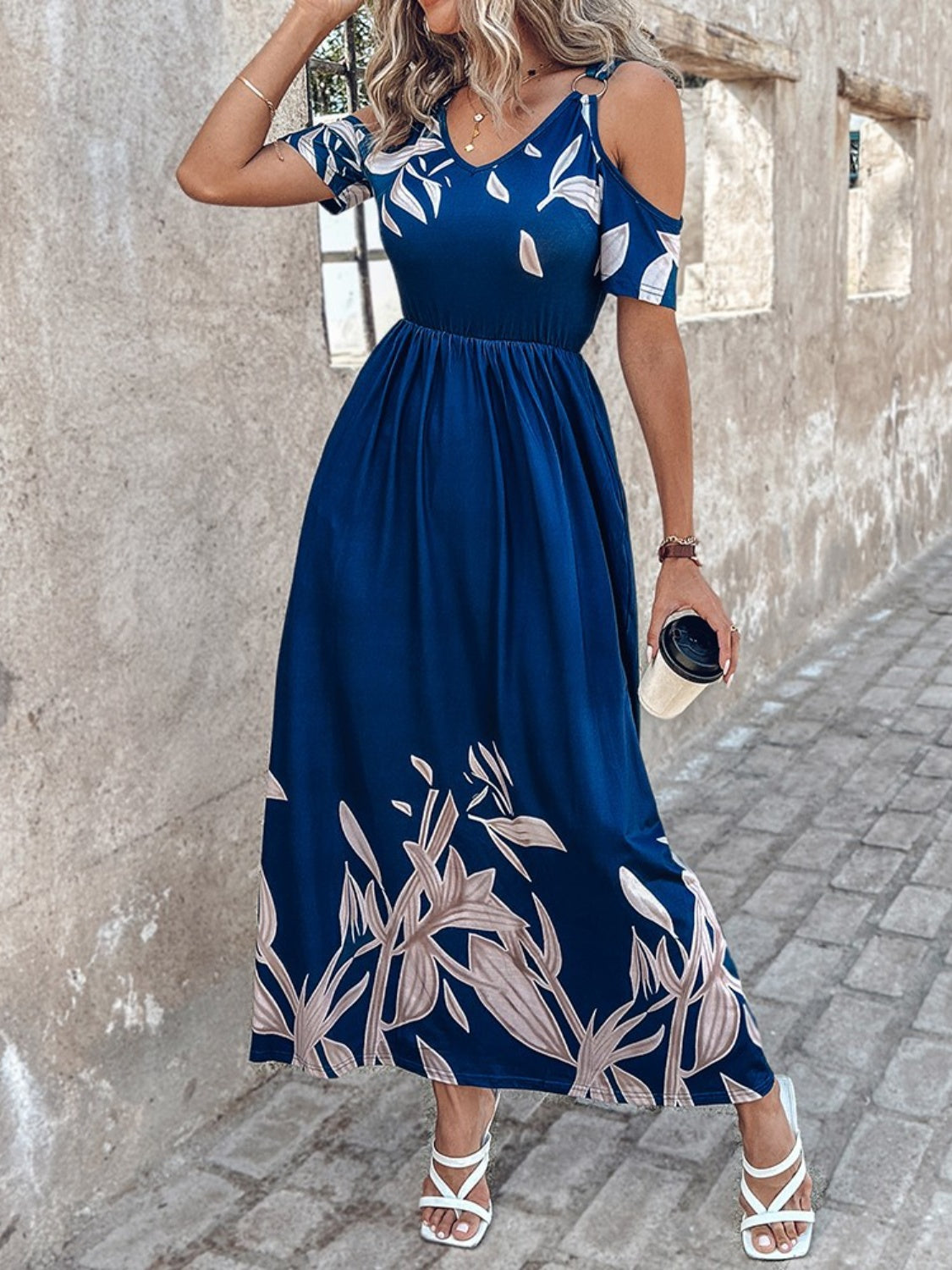 A stylish Printed Cold Shoulder Short Sleeve Maxi Dress featuring a trendy design, side pockets, and a lightweight fabric, perfect for summer wear.