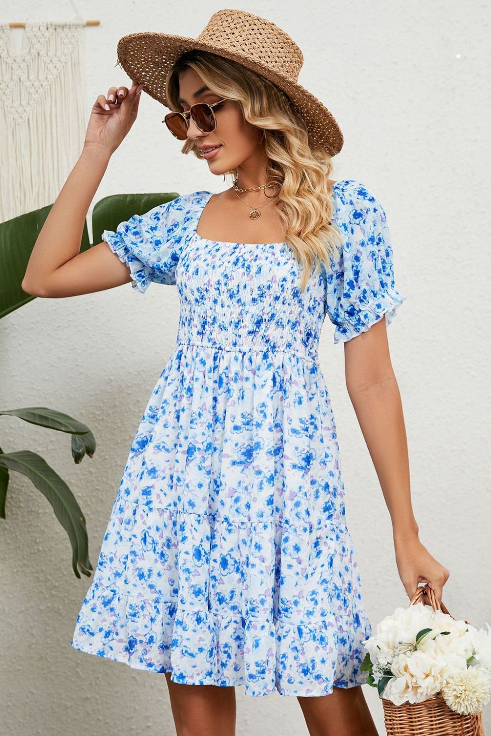 A stylish Printed Flounce Sleeve Smocked Dress featuring a floral pattern, square neckline, and puff sleeves, perfect for casual outings.