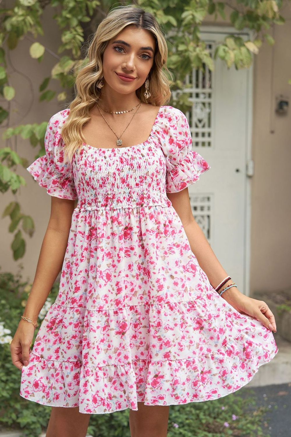 A stylish Printed Flounce Sleeve Smocked Dress featuring a floral pattern, square neckline, and puff sleeves, perfect for casual outings.