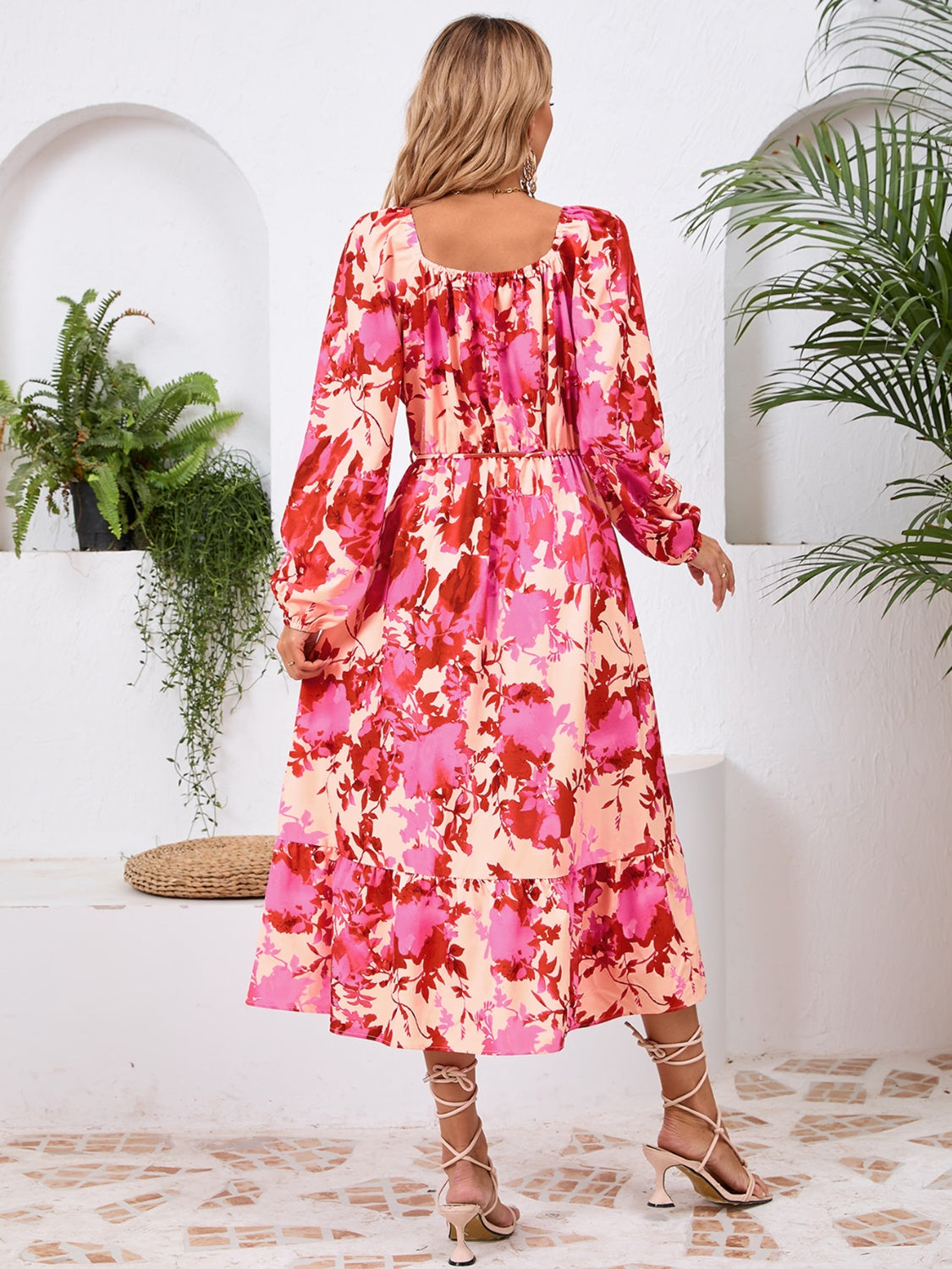 A stylish Printed Long Sleeve Midi Dress featuring a tied design, long sleeves, and a vibrant print, perfect for various occasions.