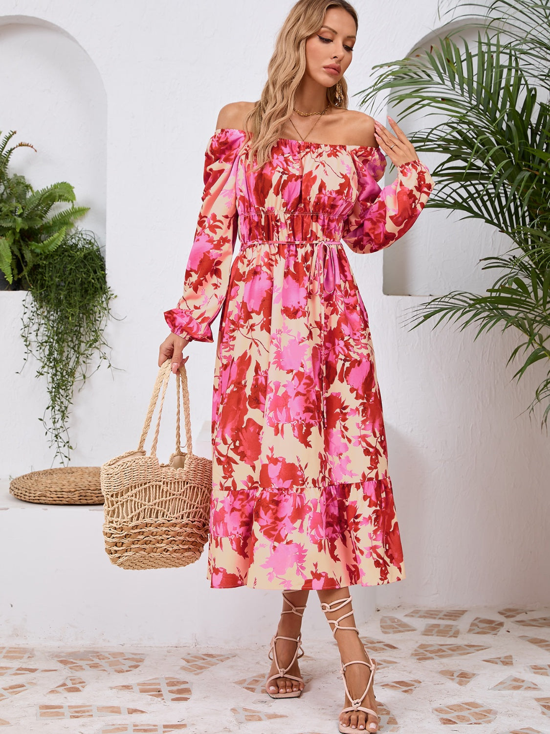 A stylish Printed Long Sleeve Midi Dress featuring a tied design, long sleeves, and a vibrant print, perfect for various occasions.