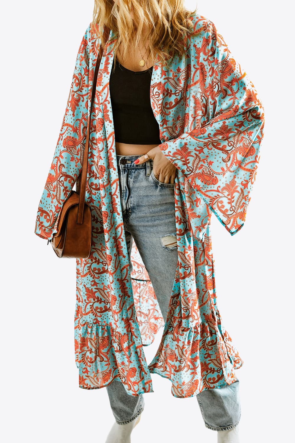 A stylish Printed Open Front Duster Cardigan featuring a floral pattern, ruffle details, and long flare sleeves, perfect for layering.