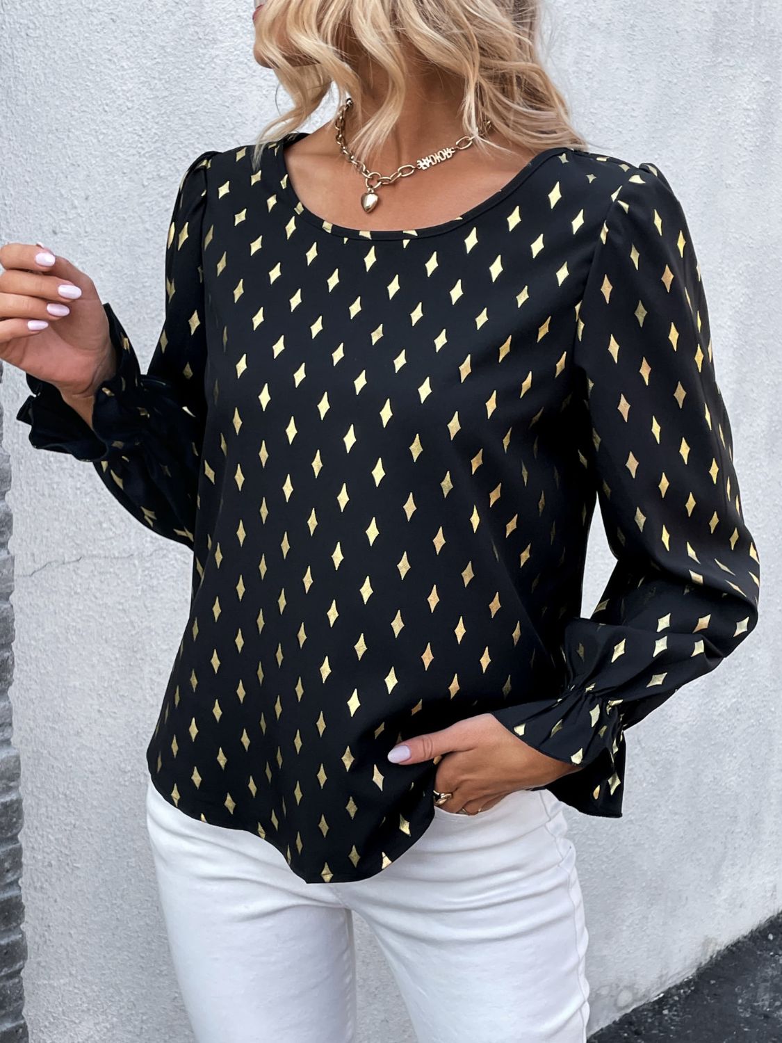 A stylish Printed Round Neck Flounce Sleeve Blouse featuring a vibrant print, round neckline, and long puff sleeves, perfect for casual wear.