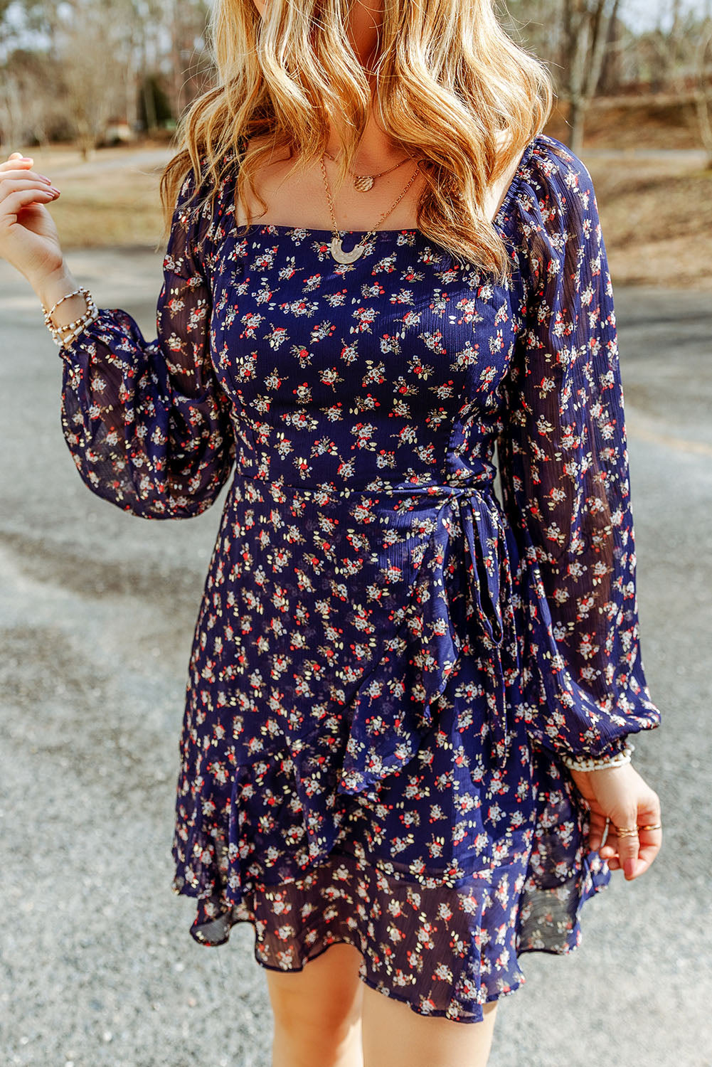 A stylish Printed Square Neck Ruffled Dress featuring a chic printed pattern, square neckline, long sleeves, and an A-line hem.