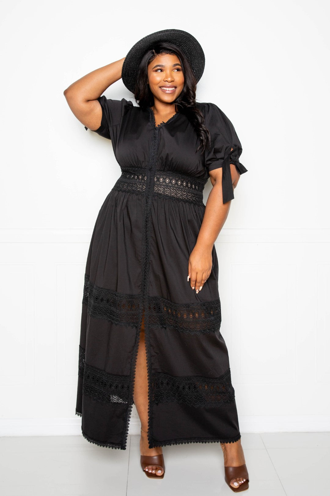 Puff Sleeve Maxi Dress featuring a lace insert, showcasing elegant puff sleeves and a flowing silhouette in black.