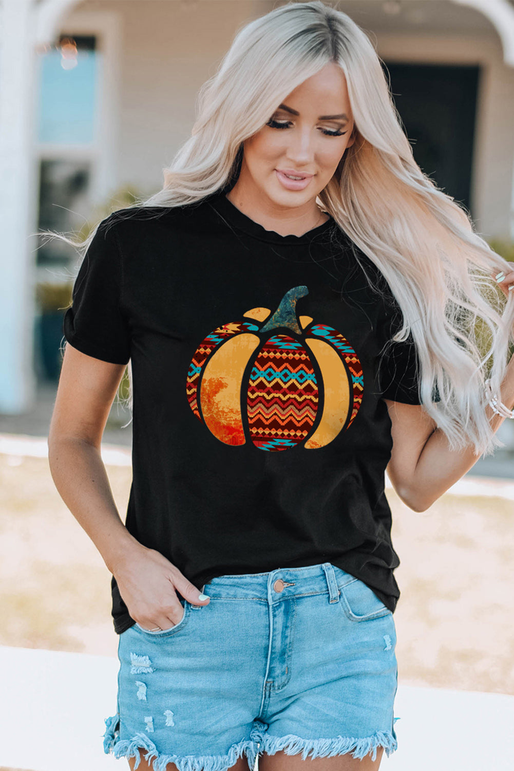 A stylish Pumpkin Graphic Cuffed Tee featuring a chic pumpkin design, round neck, and short sleeves, perfect for casual fall wear.