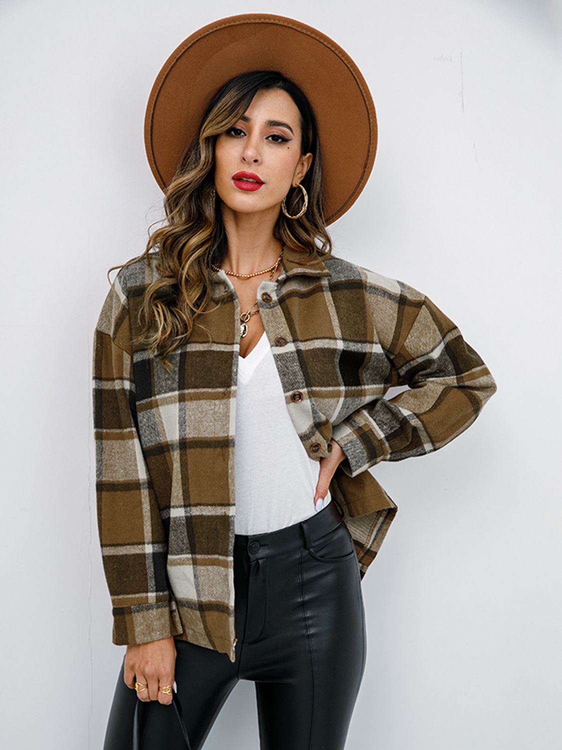 Pumpkin Spice Button-Down Jacket featuring a chic plaid design, collared neck, and long sleeves, perfect for fall fashion.