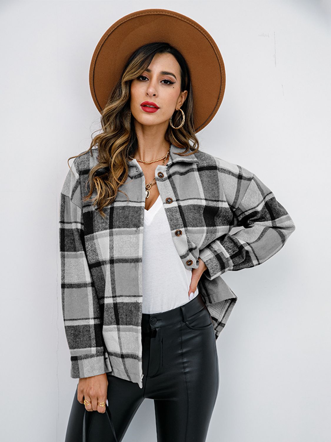 Pumpkin Spice Button-Down Jacket featuring a chic plaid design, collared neck, and long sleeves, perfect for fall fashion.