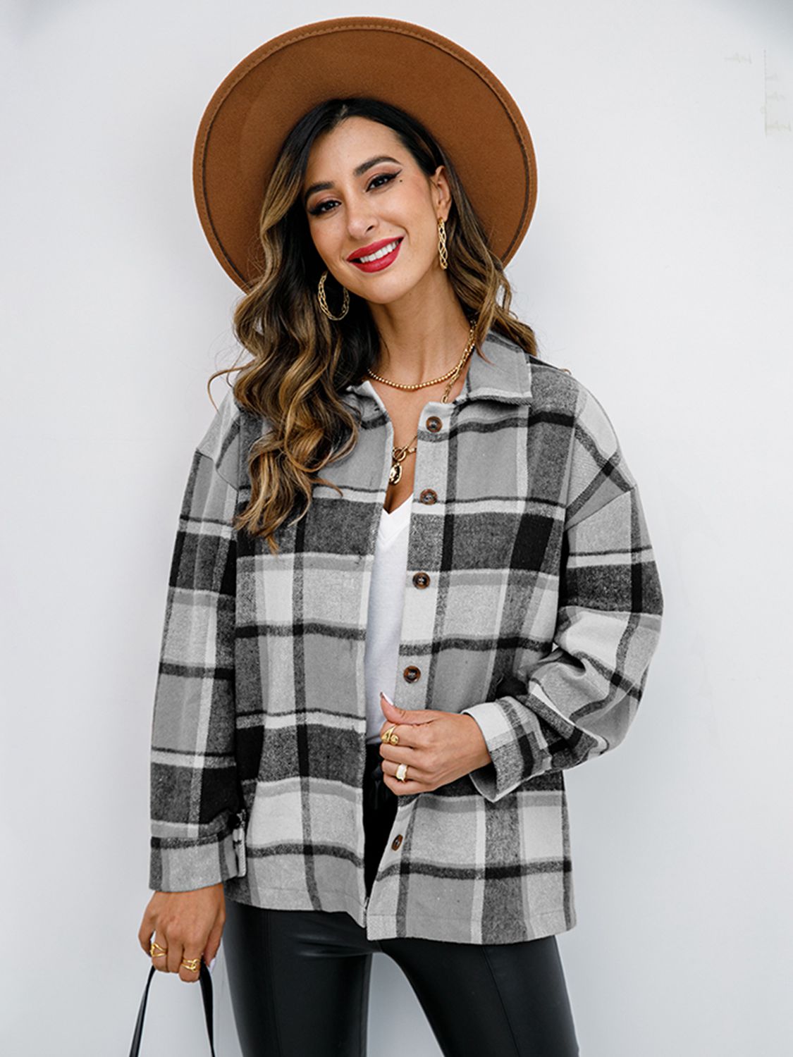 Pumpkin Spice Button-Down Jacket featuring a chic plaid design, collared neck, and long sleeves, perfect for fall fashion.