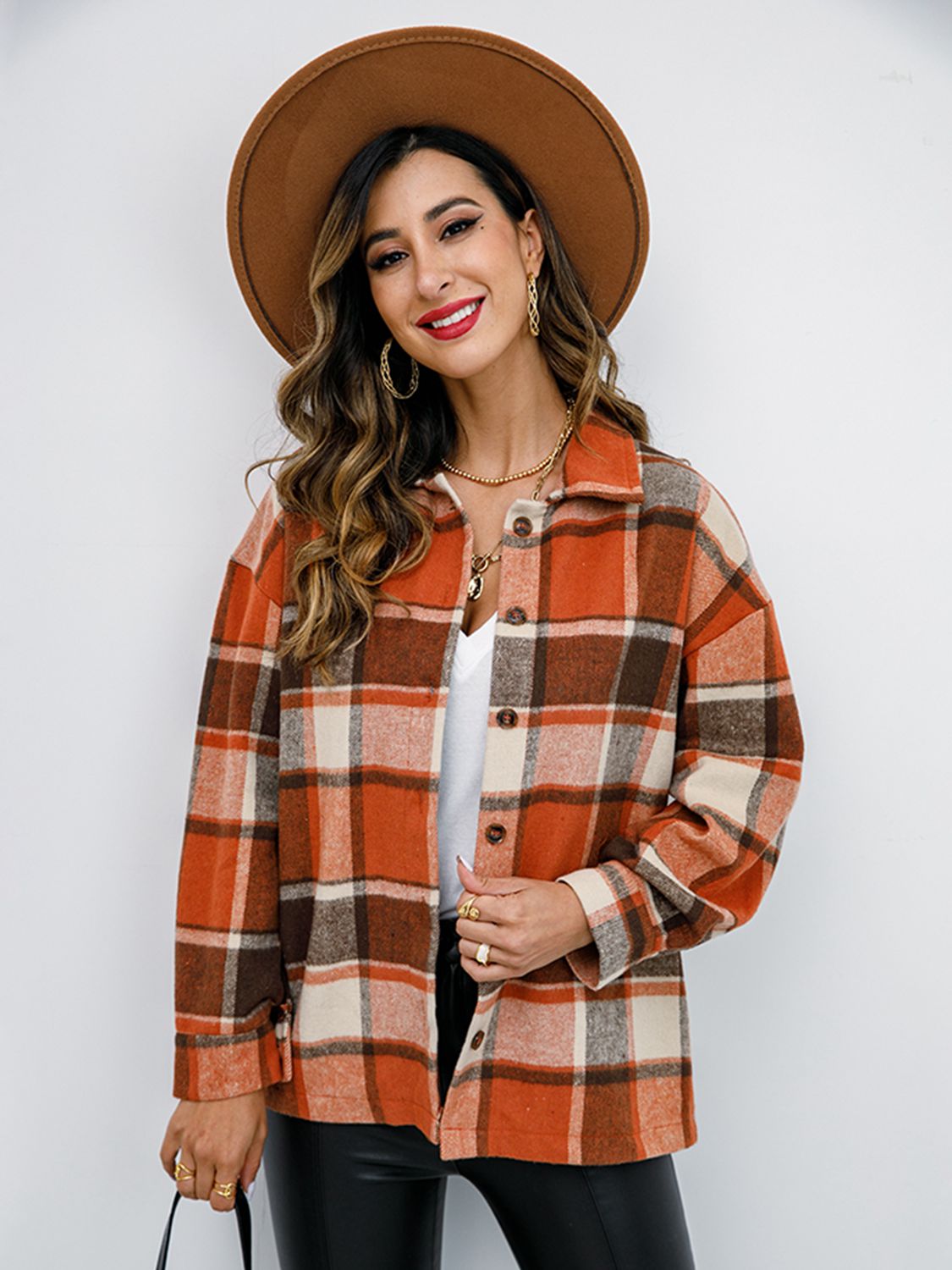 Pumpkin Spice Button-Down Jacket featuring a chic plaid design, collared neck, and long sleeves, perfect for fall fashion.