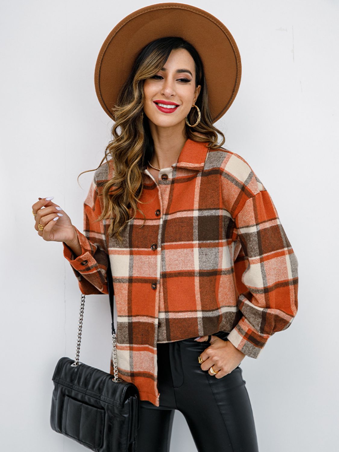 Pumpkin Spice Button-Down Jacket featuring a chic plaid design, collared neck, and long sleeves, perfect for fall fashion.