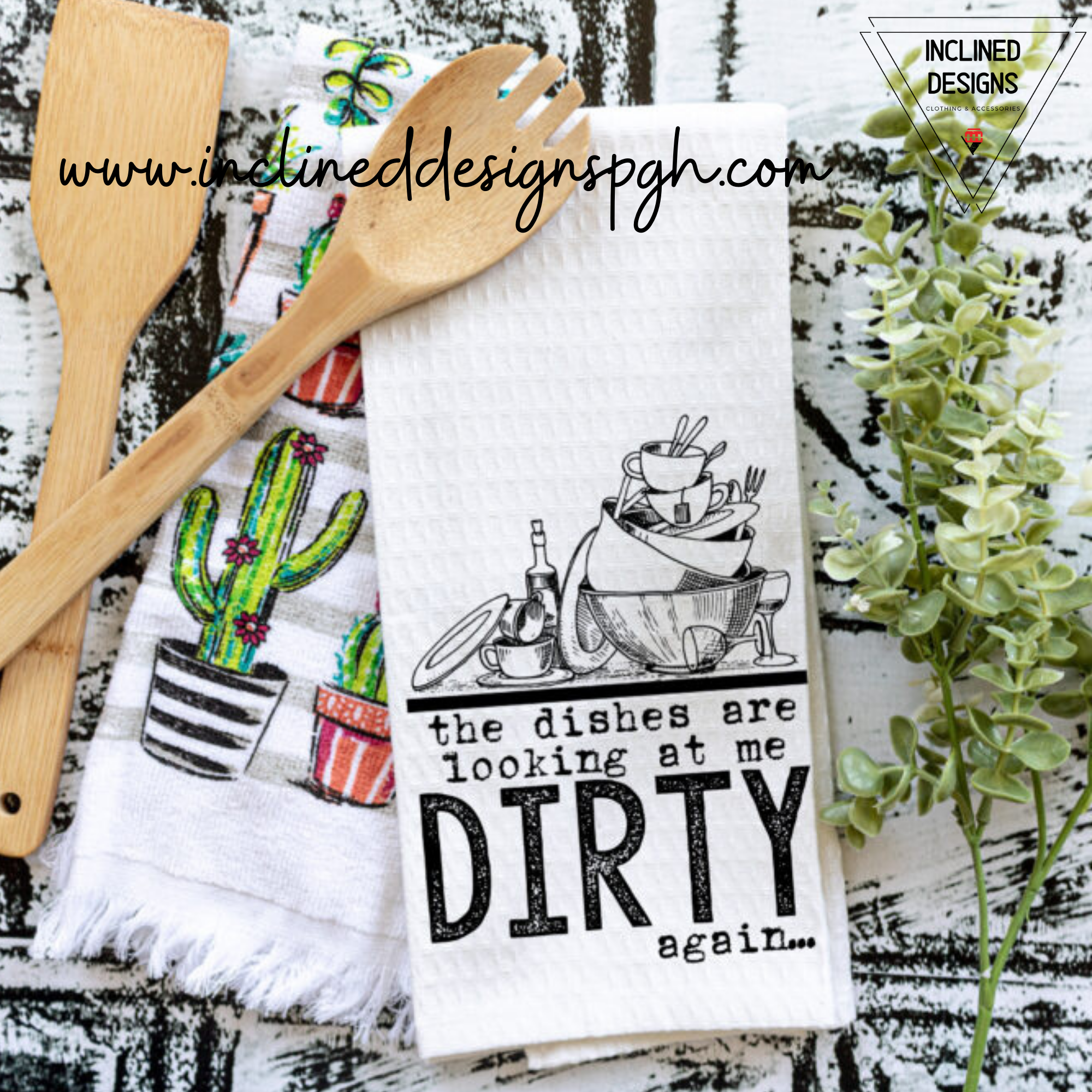 A collection of colorful Punny Tea Towels featuring humorous sayings, made from 100% cotton, displayed in a bright kitchen setting.