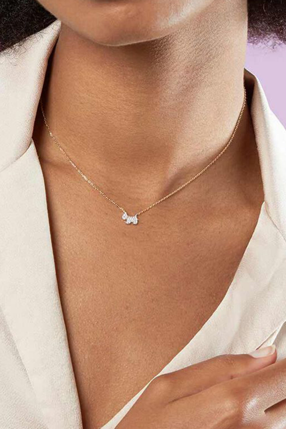 Puppy Zircon 925 Sterling Silver Necklace featuring zircon accents and 18K gold-plated finish, displayed elegantly on a soft background.