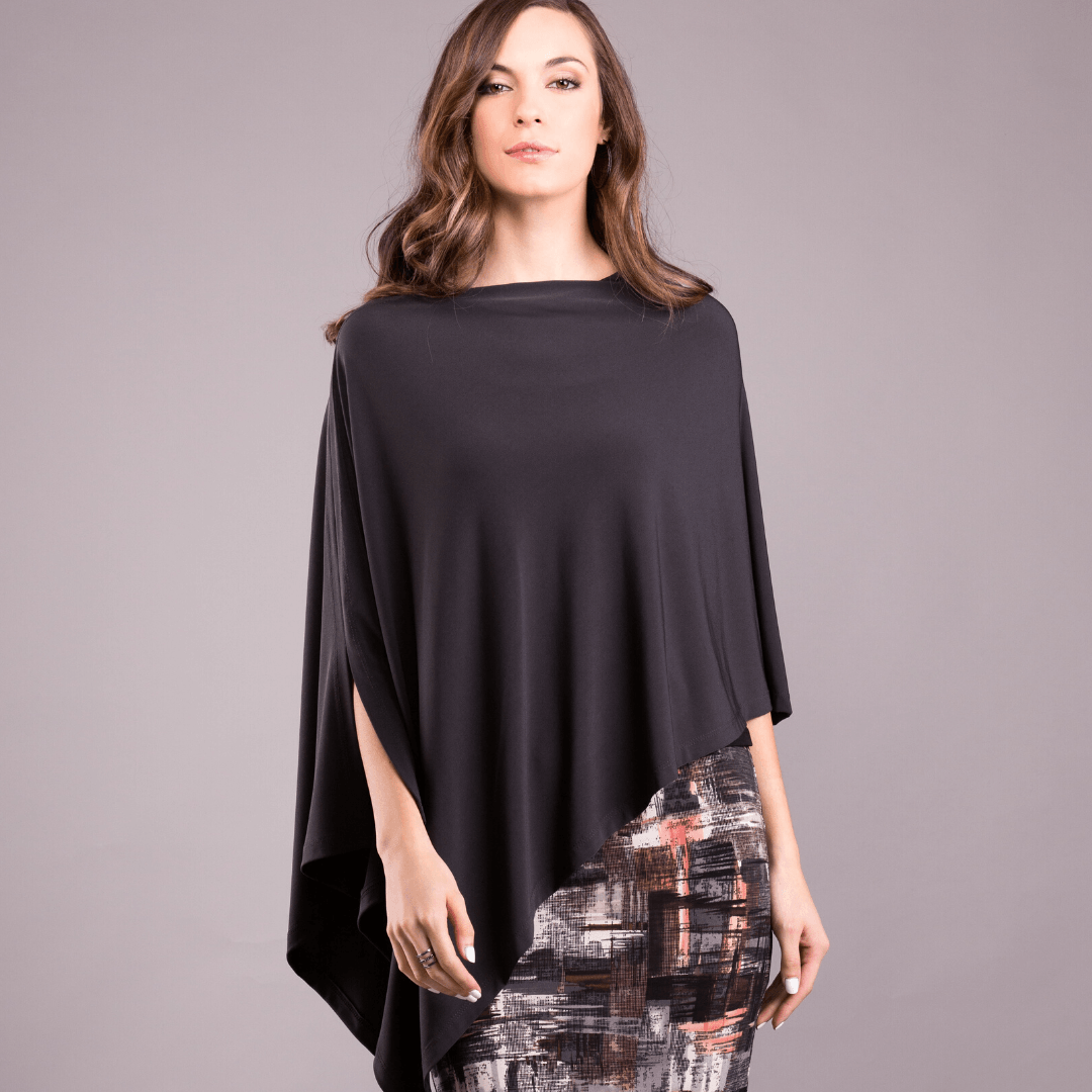 A stylish Pure Poncho in soft stretch knit fabric, showcasing its versatile design and seam detail.