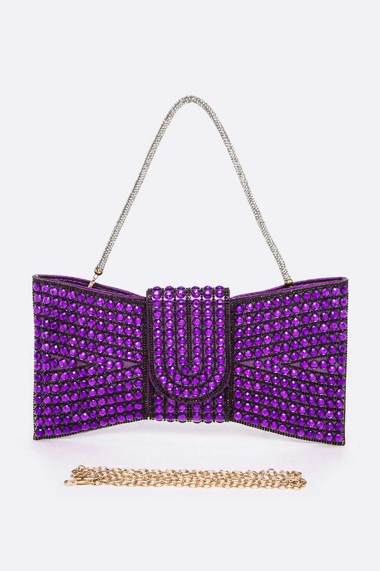 A stylish purple handbag featuring a shoulder chain and handle, with snap-on and zipper closure.