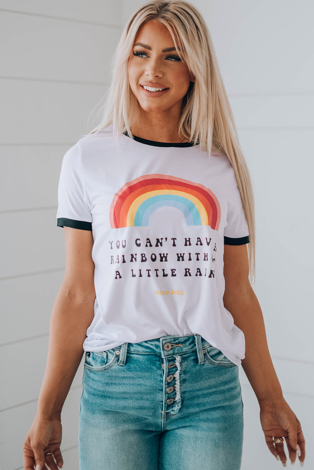 A colorful rainbow graphic short sleeve tee displayed on a mannequin, showcasing its casual style and round neckline.