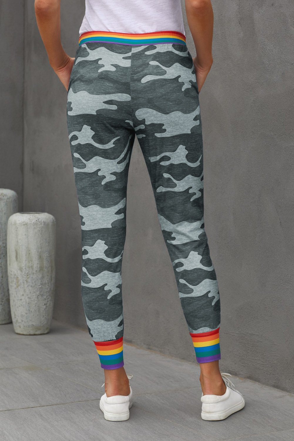 Rainbow Stripe Gray Camo Casual Pants featuring a unique camo print with a colorful rainbow waistband and ankle details.