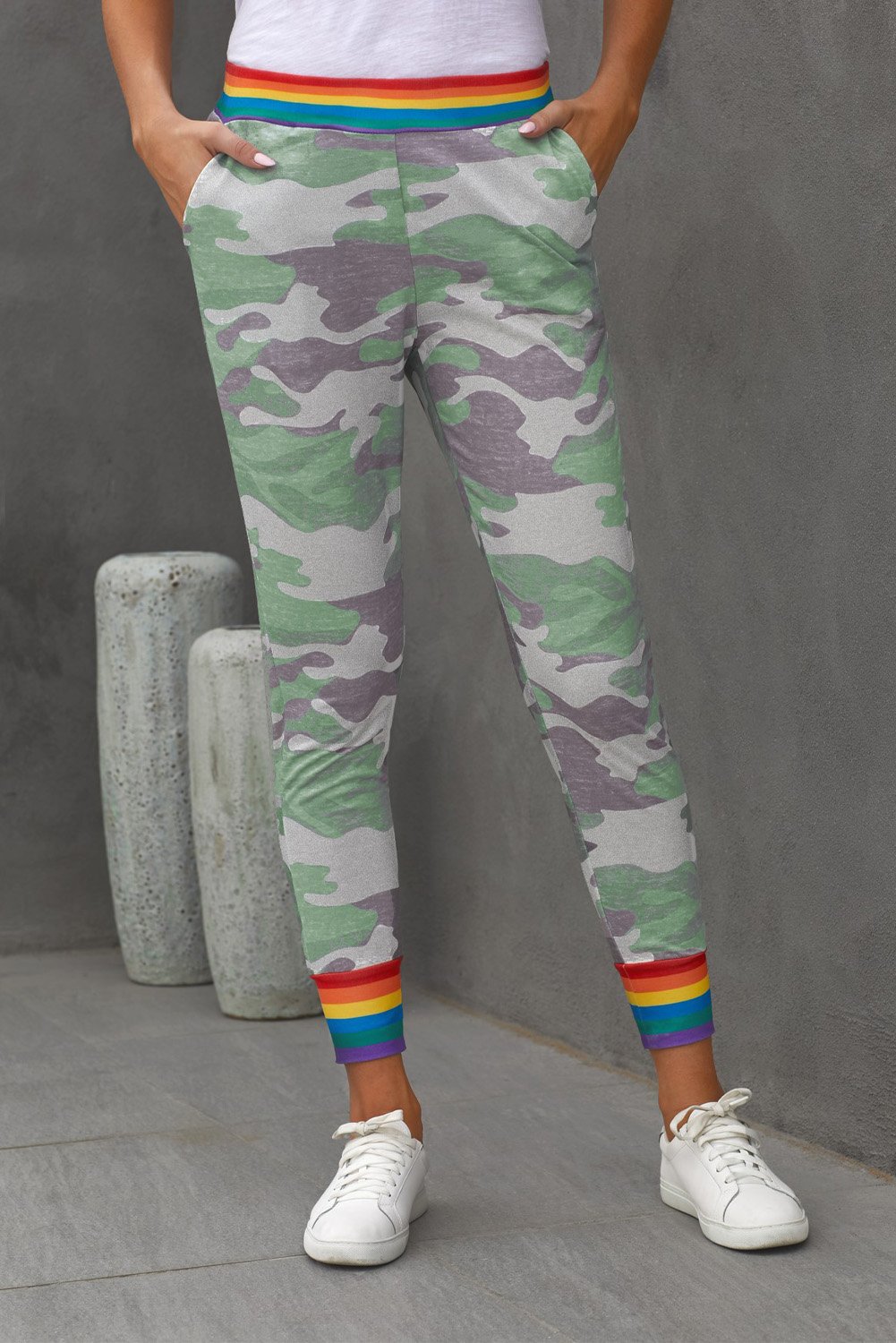 Rainbow Stripe Gray Camo Casual Pants featuring a unique camo print with a colorful rainbow waistband and ankle details.