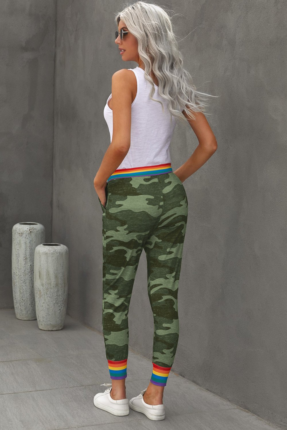 Rainbow Stripe Gray Camo Casual Pants featuring a unique camo print with a colorful rainbow waistband and ankle details.