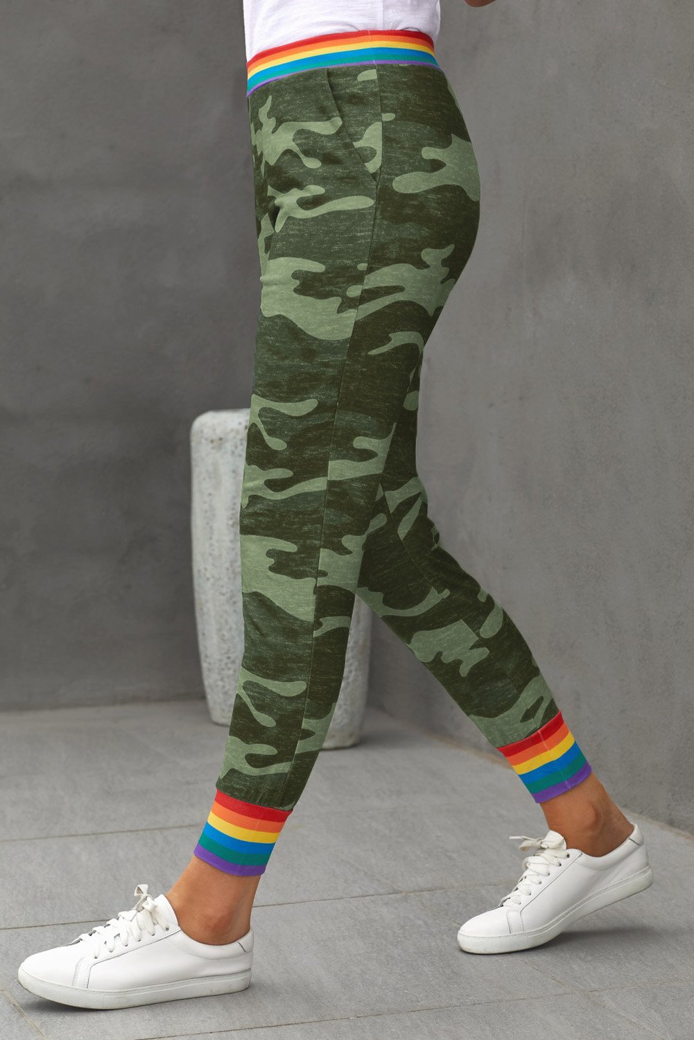 Rainbow Stripe Gray Camo Casual Pants featuring a unique camo print with a colorful rainbow waistband and ankle details.