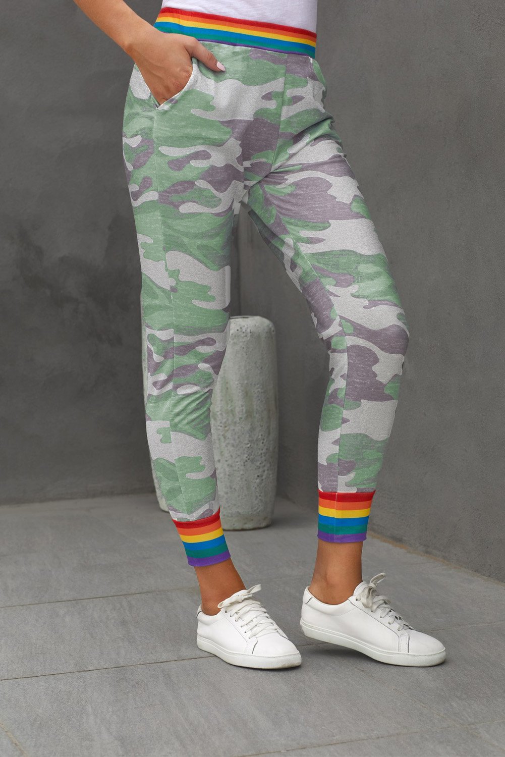 Rainbow Stripe Gray Camo Casual Pants featuring a unique camo print with a colorful rainbow waistband and ankle details.