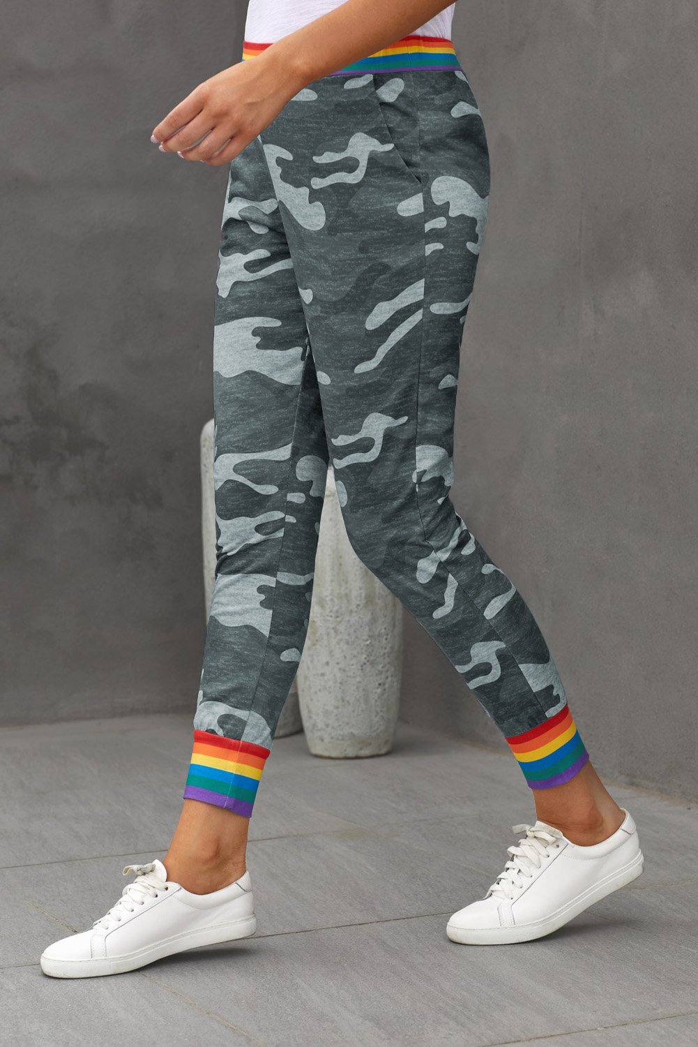 Rainbow Stripe Gray Camo Casual Pants featuring a unique camo print with a colorful rainbow waistband and ankle details.