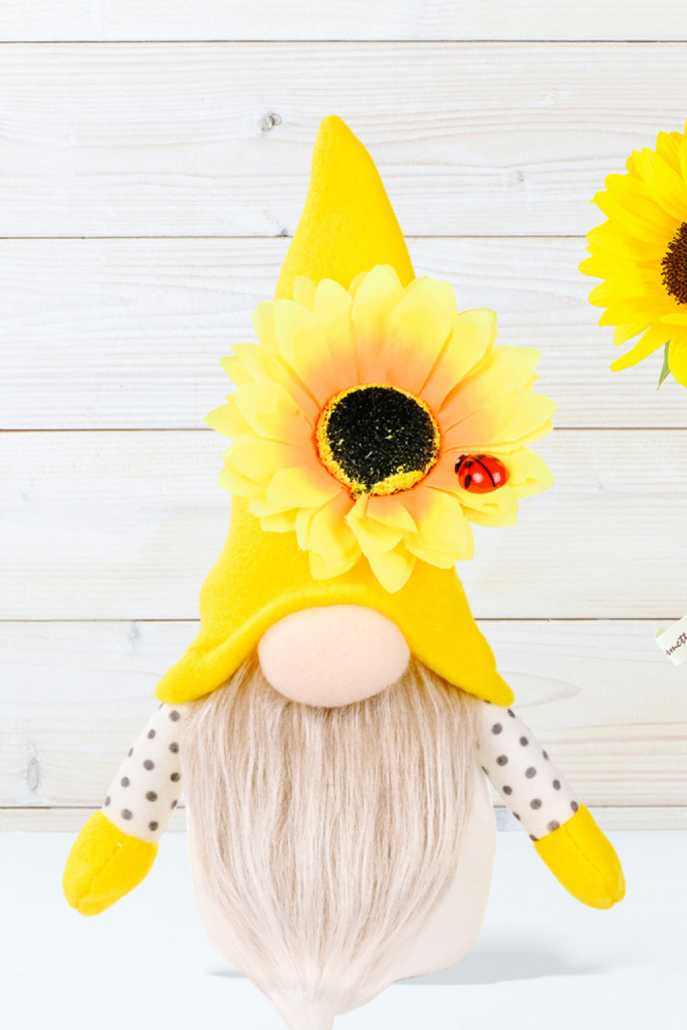 Three charming sunflower faceless gnomes made of brushed flannel and PP cotton, showcasing a whimsical design perfect for home decor.