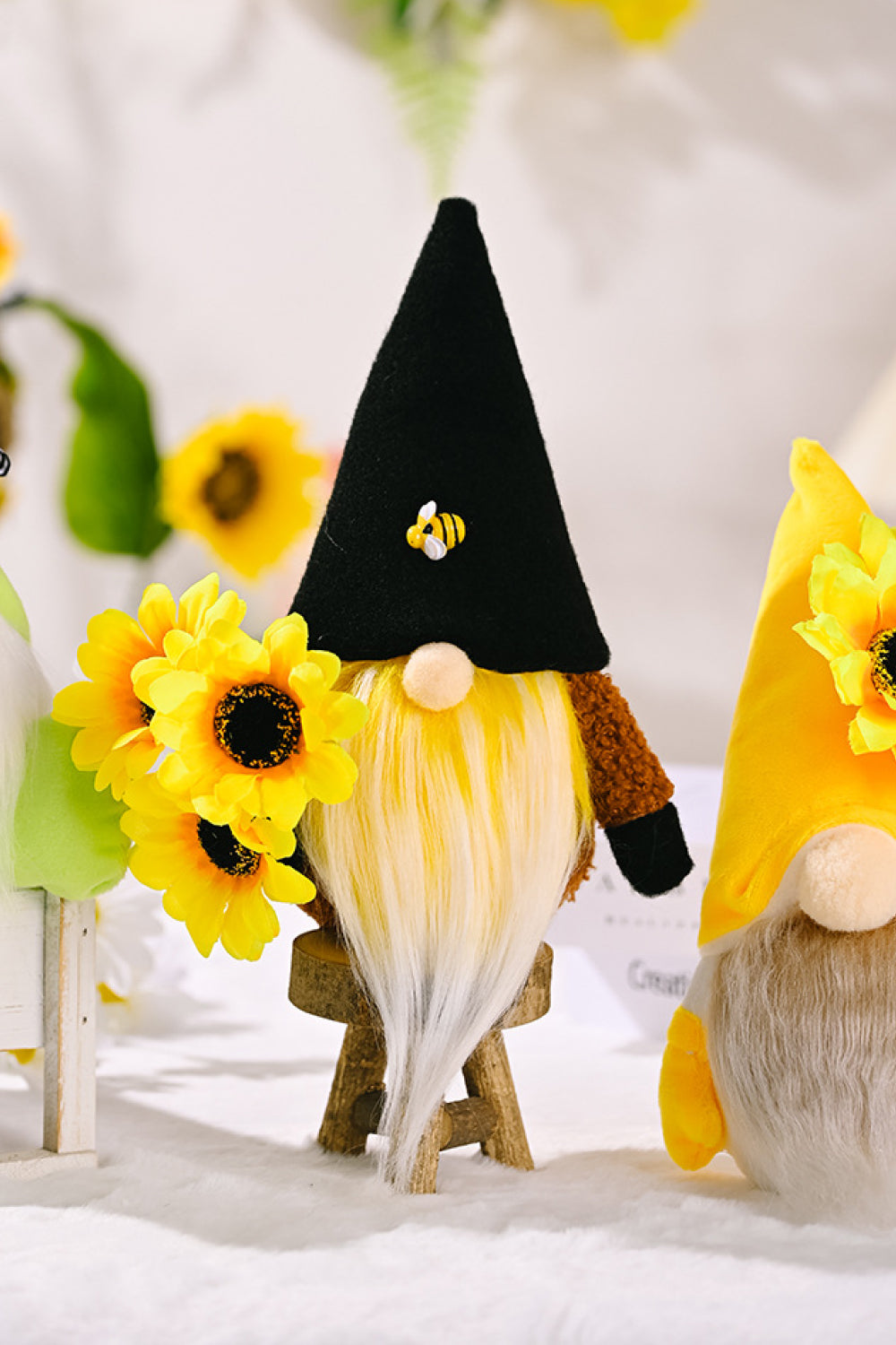 Three charming sunflower faceless gnomes made of brushed flannel and PP cotton, showcasing a whimsical design perfect for home decor.