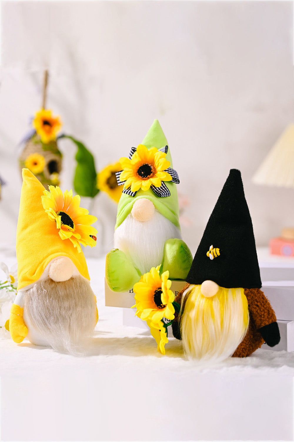 Three charming sunflower faceless gnomes made of brushed flannel and PP cotton, showcasing a whimsical design perfect for home decor.