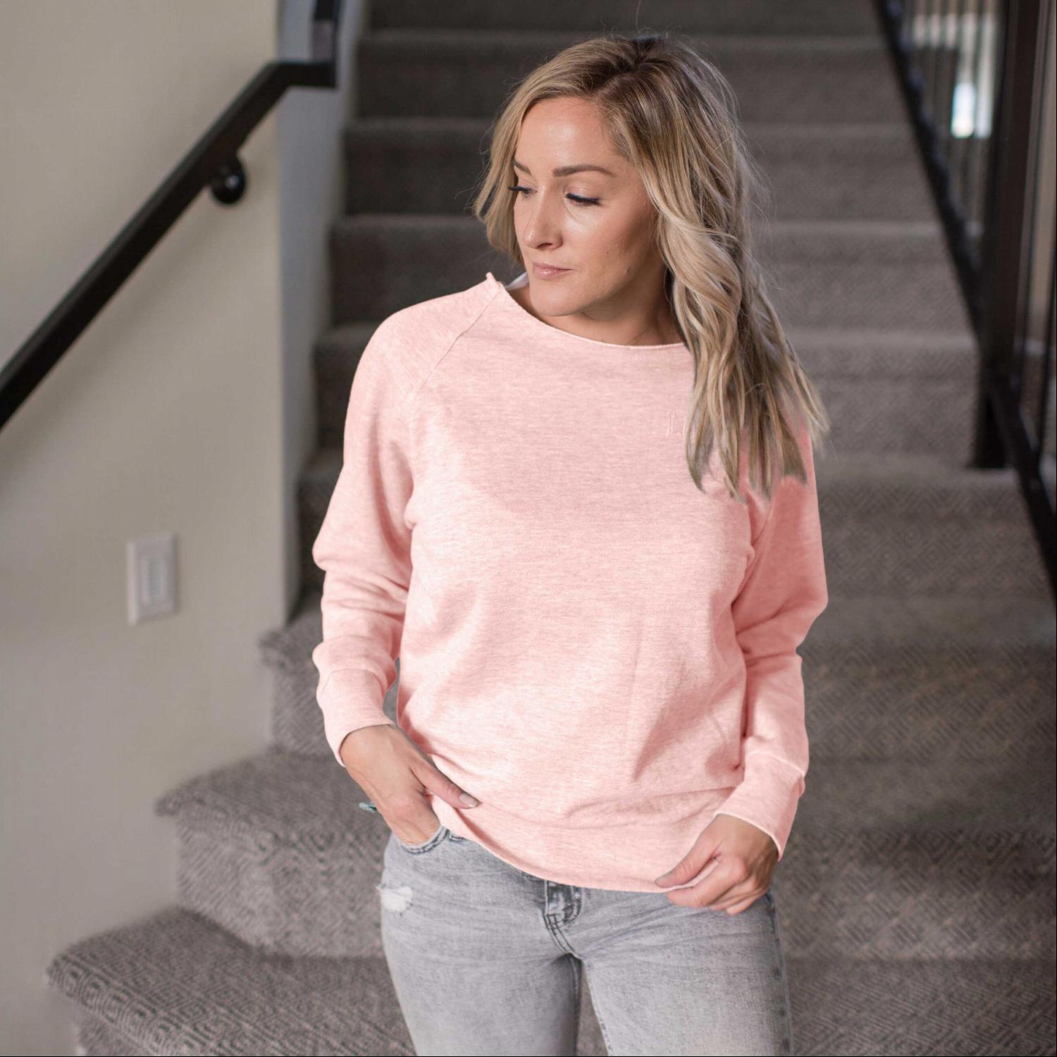 A stylish oversized Raw Neck Top in elegant pastel colors, featuring a slouchy raw-hem neckline and voluminous sleeves.