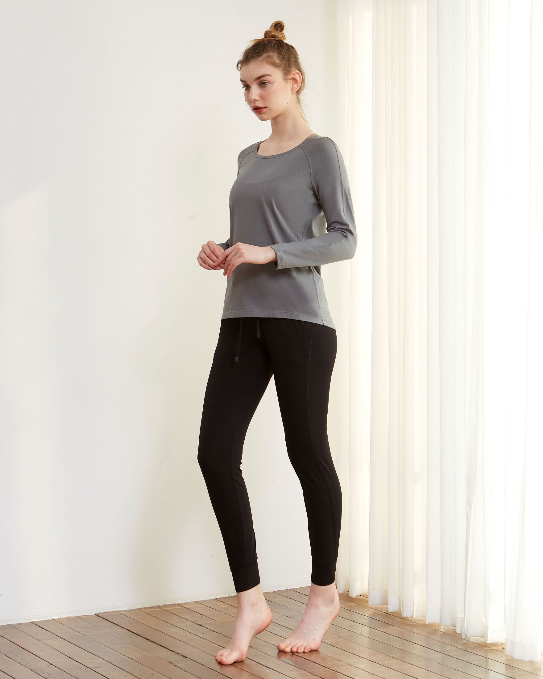 Rebody Essentials Scooped Long Sleeve Top in soft Pima cotton blend, featuring a stylish scooped neckline and long sleeves.