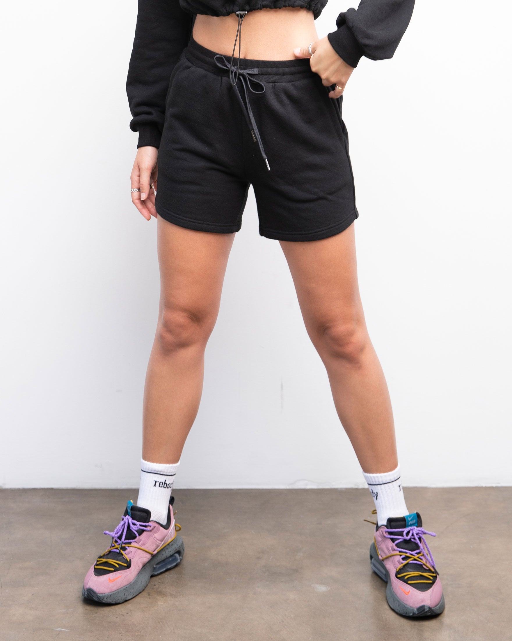 Rebody French Terry Biker Sweatshorts in a stylish design, featuring shoelace drawstrings and pockets, made from durable French Terry fabric.