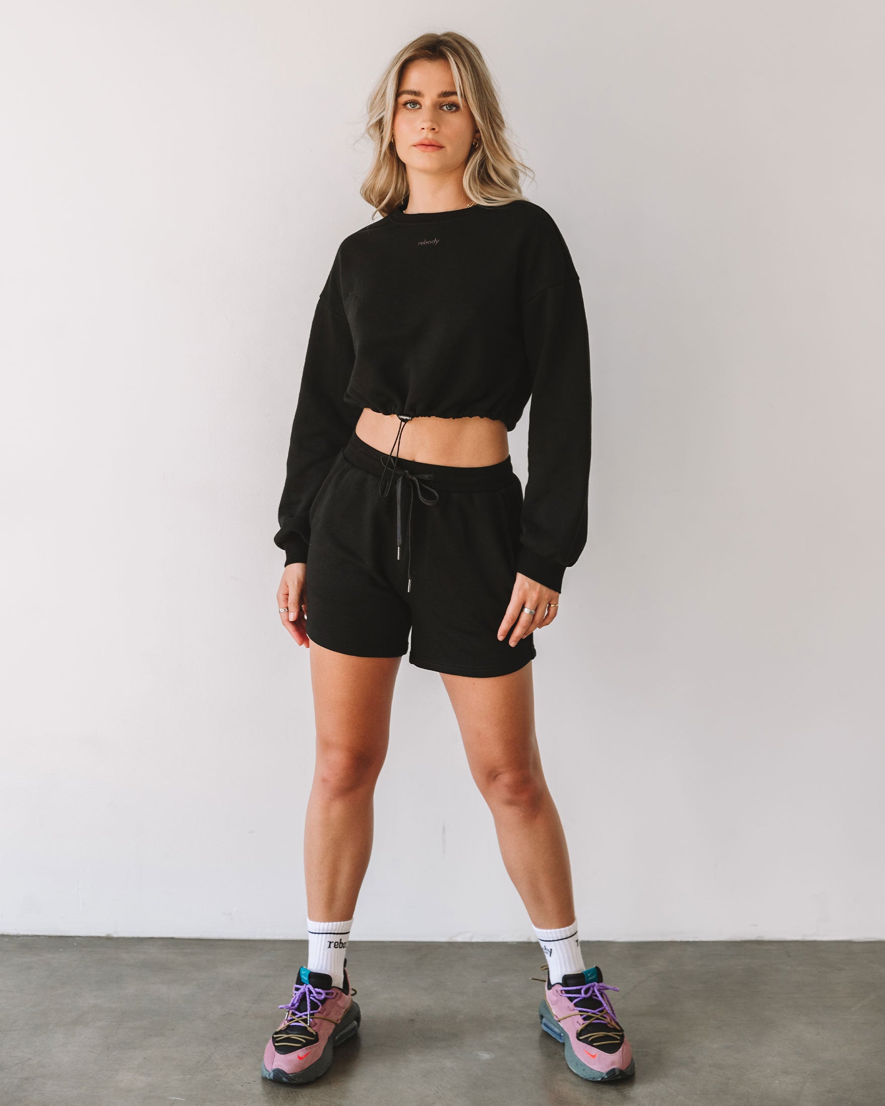 Rebody French Terry Biker Sweatshorts in a stylish design, featuring shoelace drawstrings and pockets, made from durable French Terry fabric.