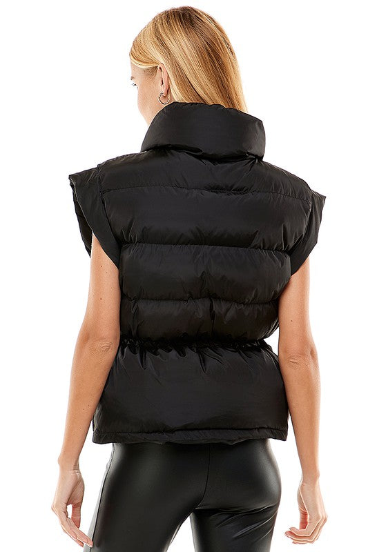 A stylish Removable Sleeve Puff Jacket with adjustable tie waist, showcasing its chic design and versatility.