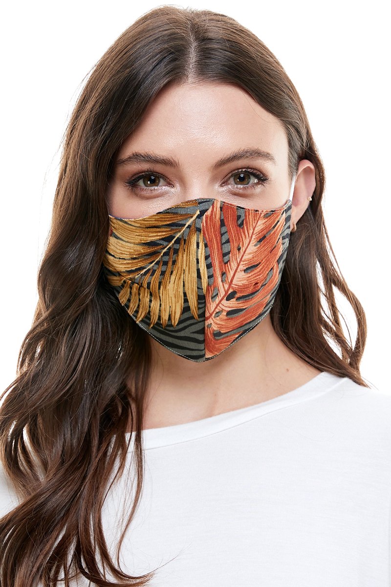 Reversible woven face mask featuring vibrant floral and tropical patterns, designed for comfort and safety.