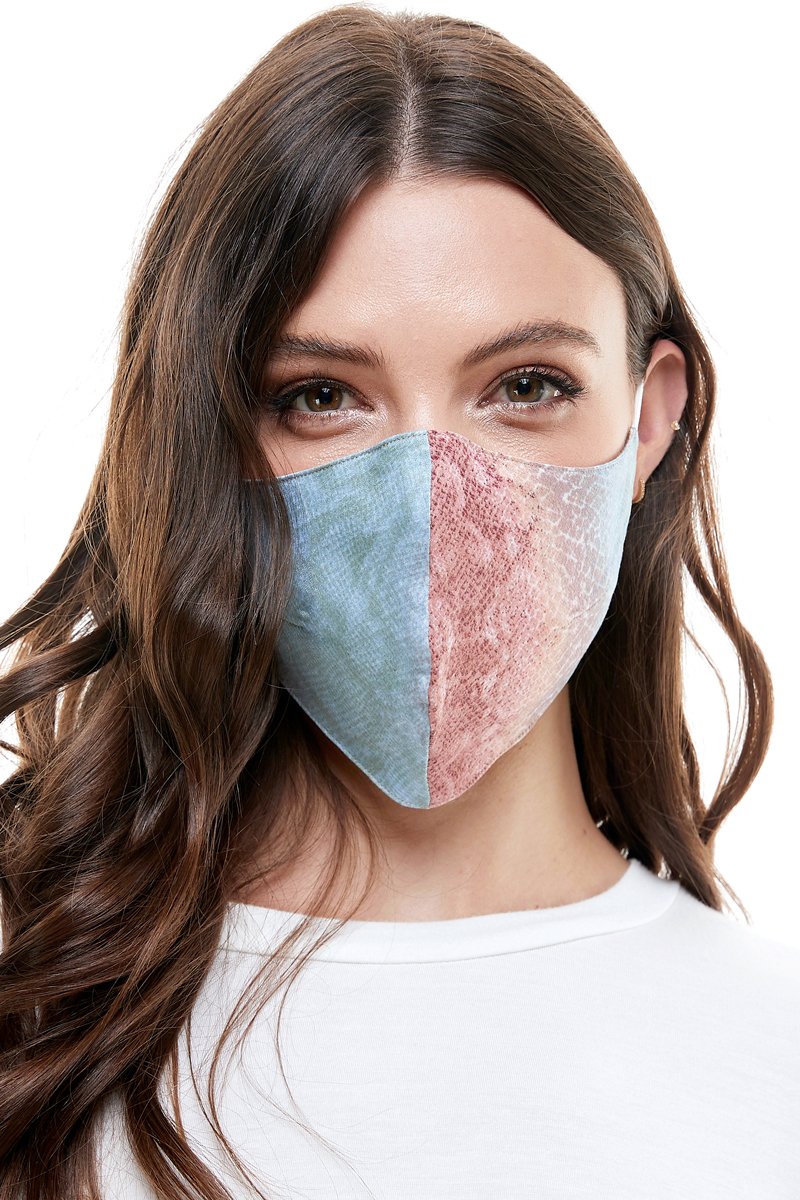 Reversible woven face mask featuring vibrant floral and tropical patterns, designed for comfort and safety.