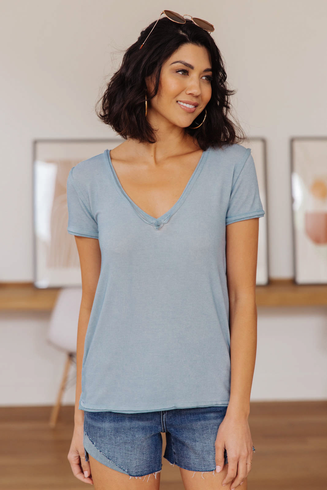 Right Side Out Top in Faded Blue featuring short sleeves and v-neckline with double fabric detail.