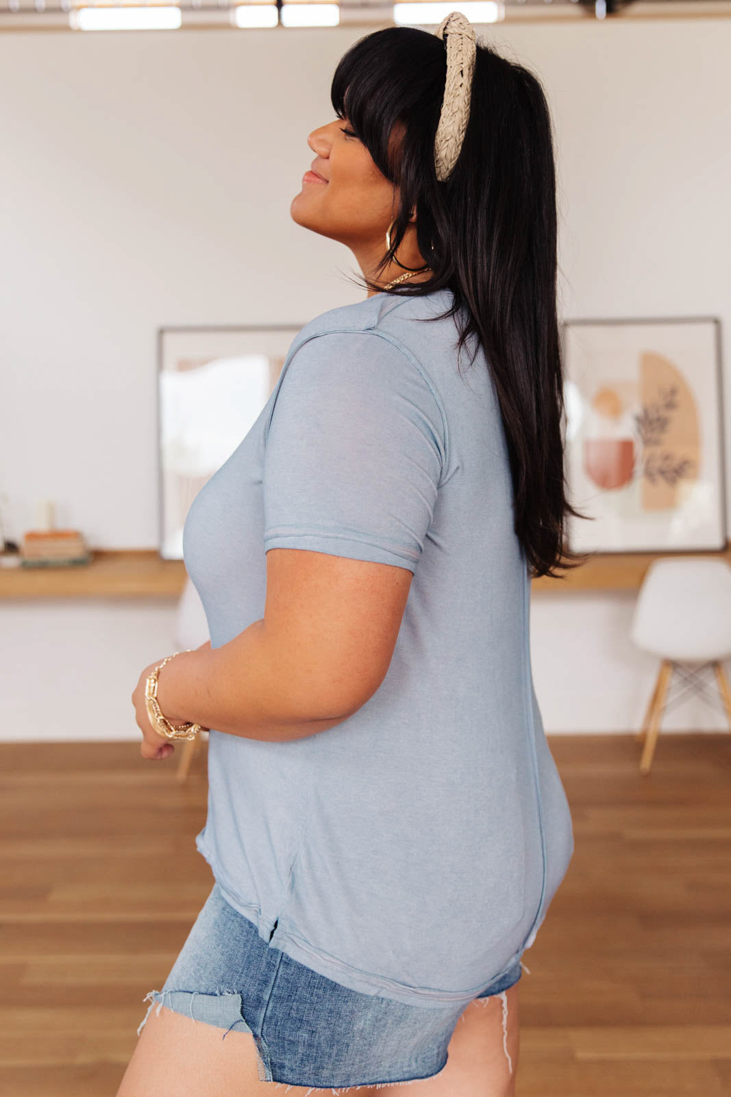 Right Side Out Top in Faded Blue featuring short sleeves and v-neckline with double fabric detail.