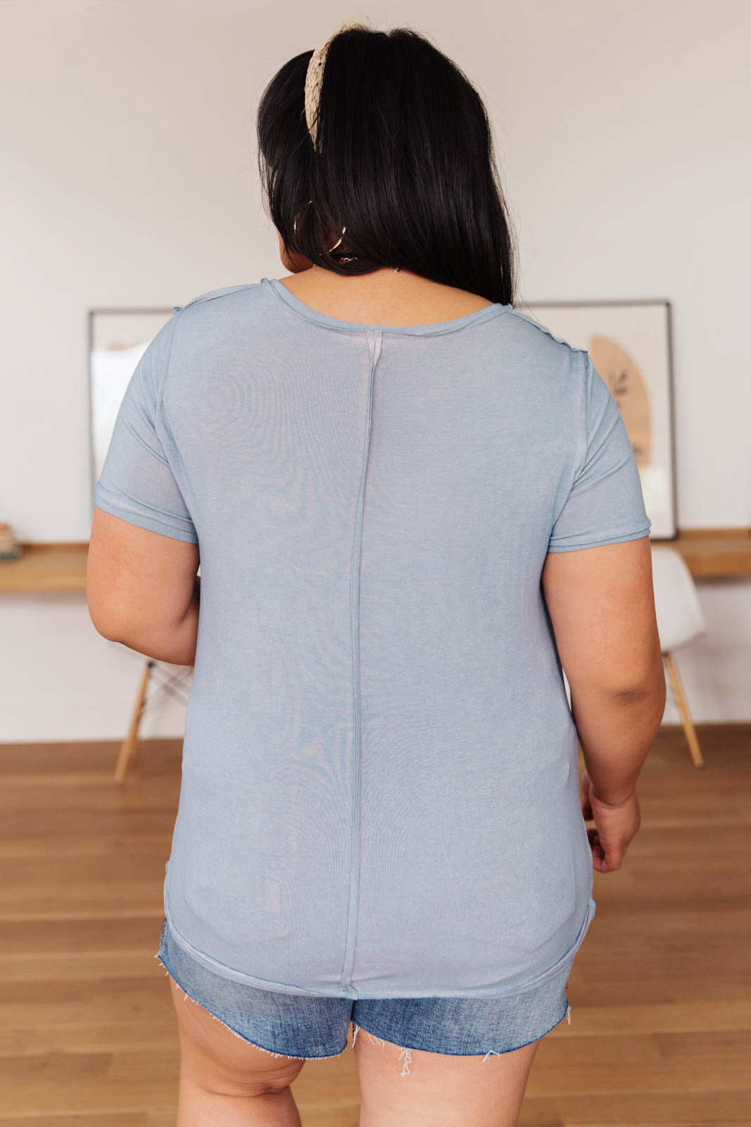 Right Side Out Top in Faded Blue featuring short sleeves and v-neckline with double fabric detail.