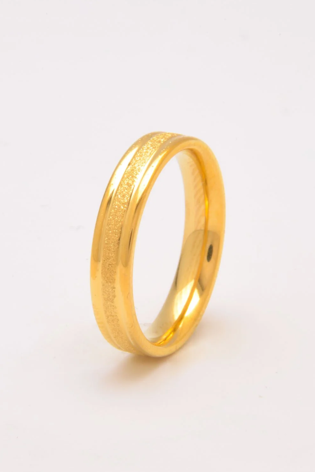 Elegant gold ring made of high-quality stainless steel, featuring a sleek design and durable finish.