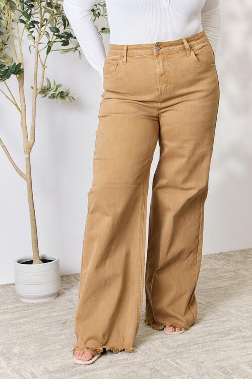 RISEN Full Size Fringe Hem Wide Leg Jeans featuring a high-waisted fit and trendy wide-leg design, perfect for casual and dressed-up occasions.