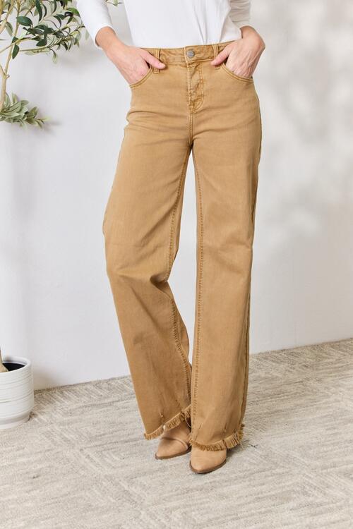 RISEN Full Size Fringe Hem Wide Leg Jeans featuring a high-waisted fit and trendy wide-leg design, perfect for casual and dressed-up occasions.