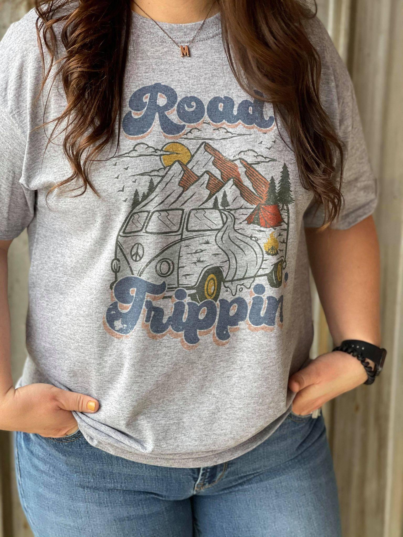 A stylish Road Trippin' Tee featuring a soft unisex fit and vibrant sublimated design, perfect for casual outings.